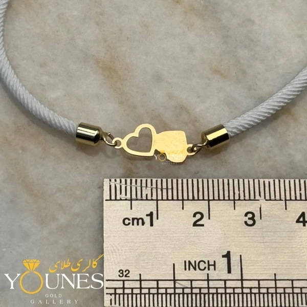 دستبند دو قلب پر و خالی طلا لیزری